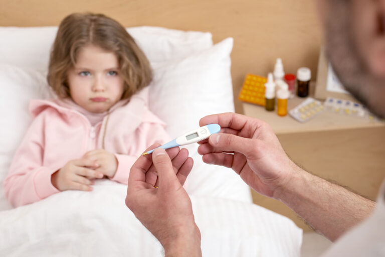 Child being cared for at home after taking a compounded paediatric medicine