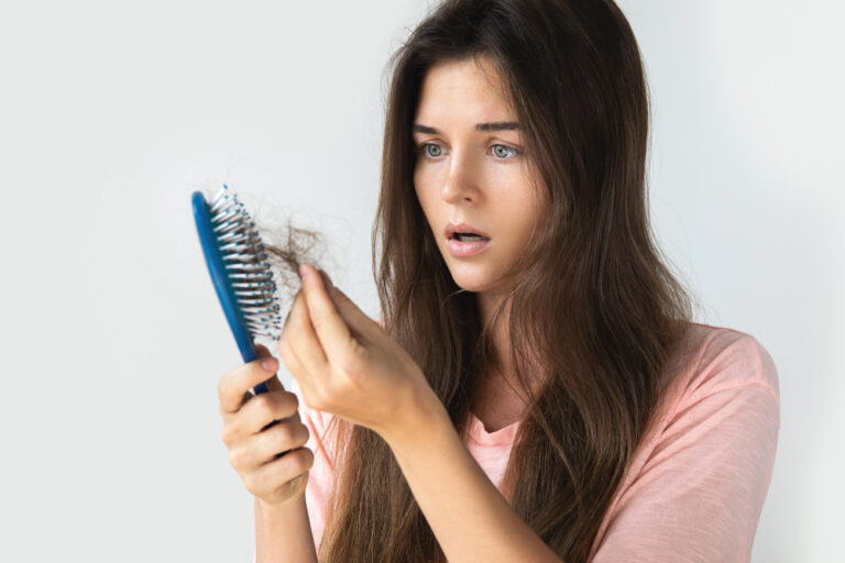 Woman with hair loss concerns who may be prescribed a compounded scalp preparation