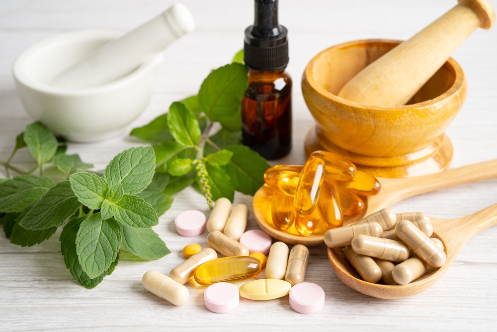 Compounding ingredients, mortar and pestle and herbal capsules at Paradise Compounding Pharmacy Surfers Paradise
